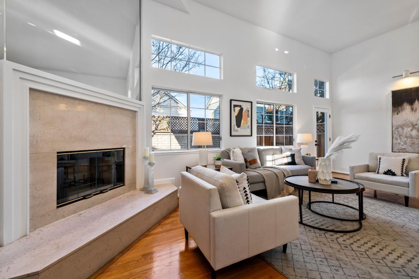 20659 Gardenside Circle Cupertino, CA 95014 - Photo 3 of 55 a living room with furniture fireplace and a fireplace