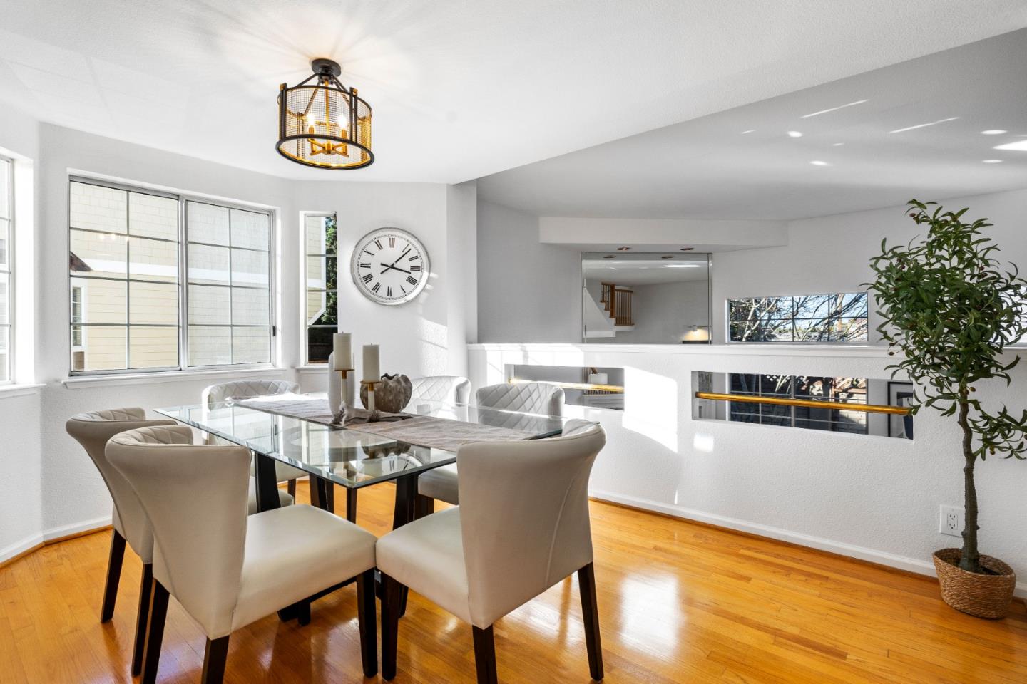 20659 Gardenside Circle Cupertino, CA 95014 - Photo 9 of 55 a view of a dining room with furniture and wooden floor