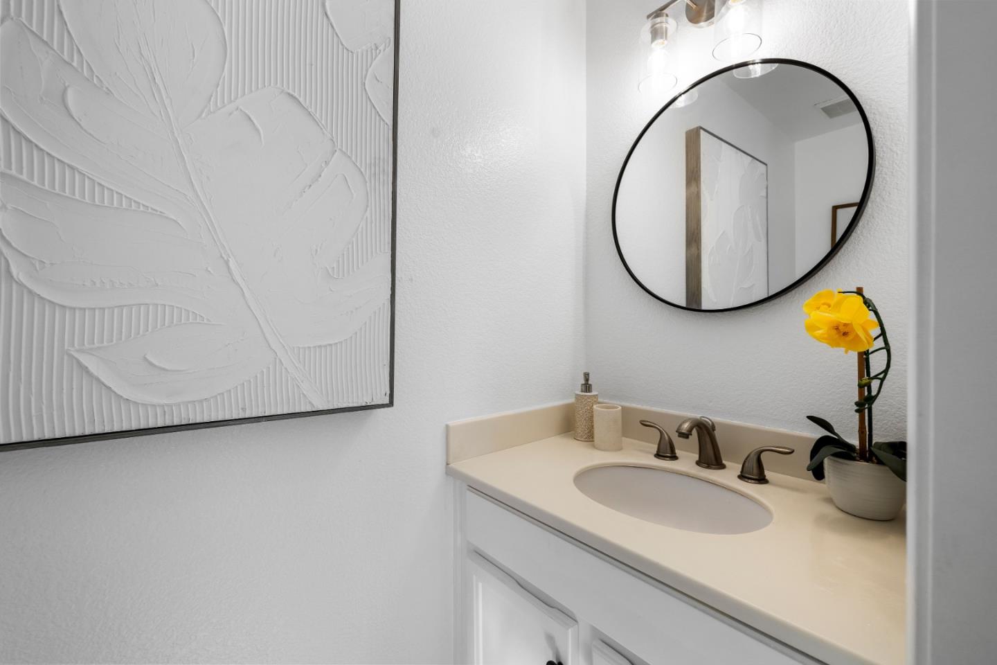 20659 Gardenside Circle Cupertino, CA 95014 - Photo 10 of 55 a bathroom with a sink and a mirror