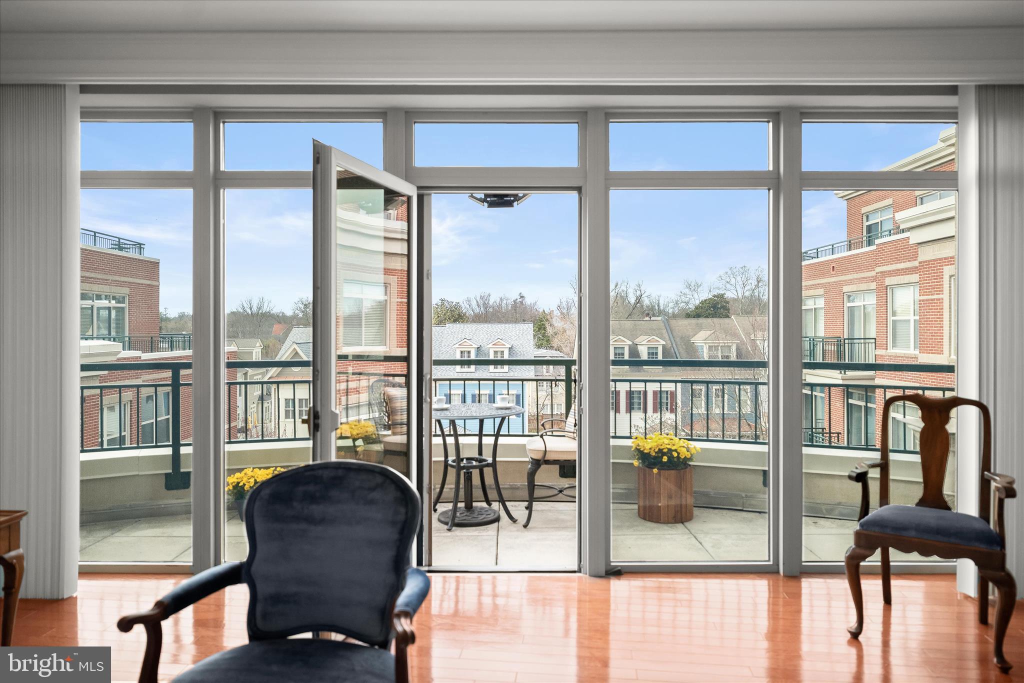 66 Franklin Street, Unit 407 Annapolis, MD 21401 - Photo 3 of 51 Large wall of windows leads to private balcony