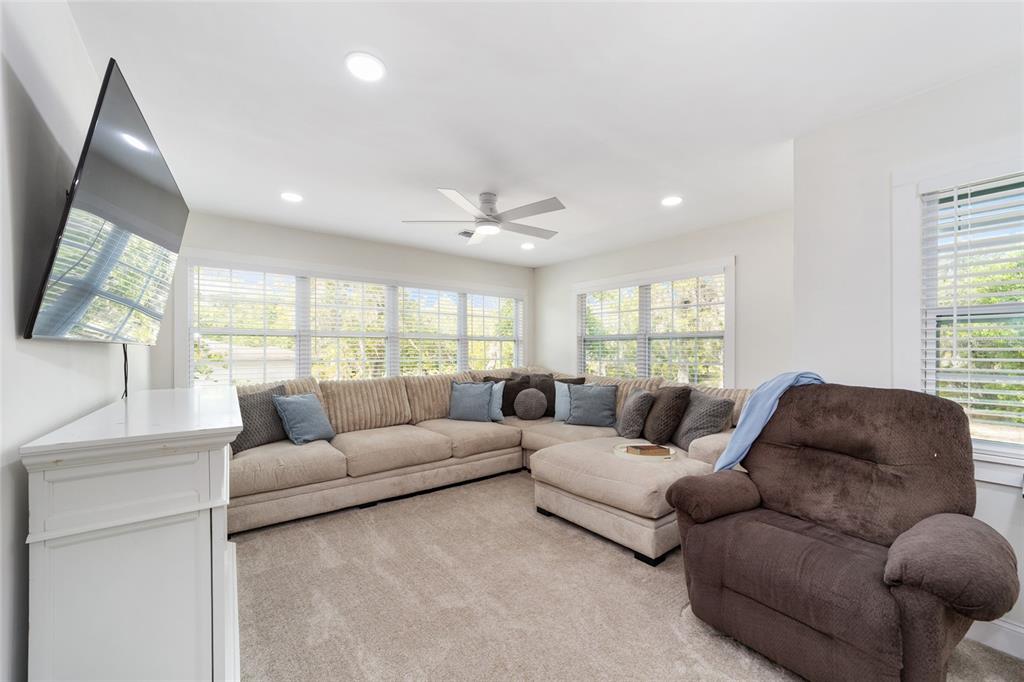 9040 Southwest 209th Circle Dunnellon, FL 34431 - Photo 12 of 55 a living room with furniture and a large window