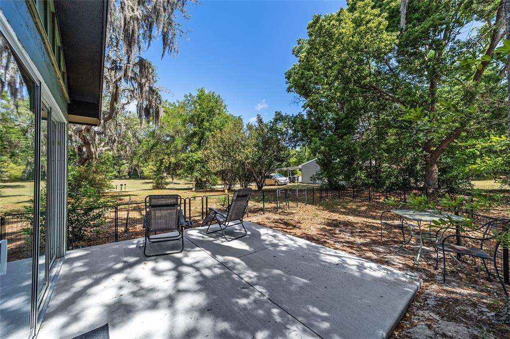 9040 Southwest 209th Circle Dunnellon, FL 34431 - Photo 43 of 55 a view of outdoor space yard and patio