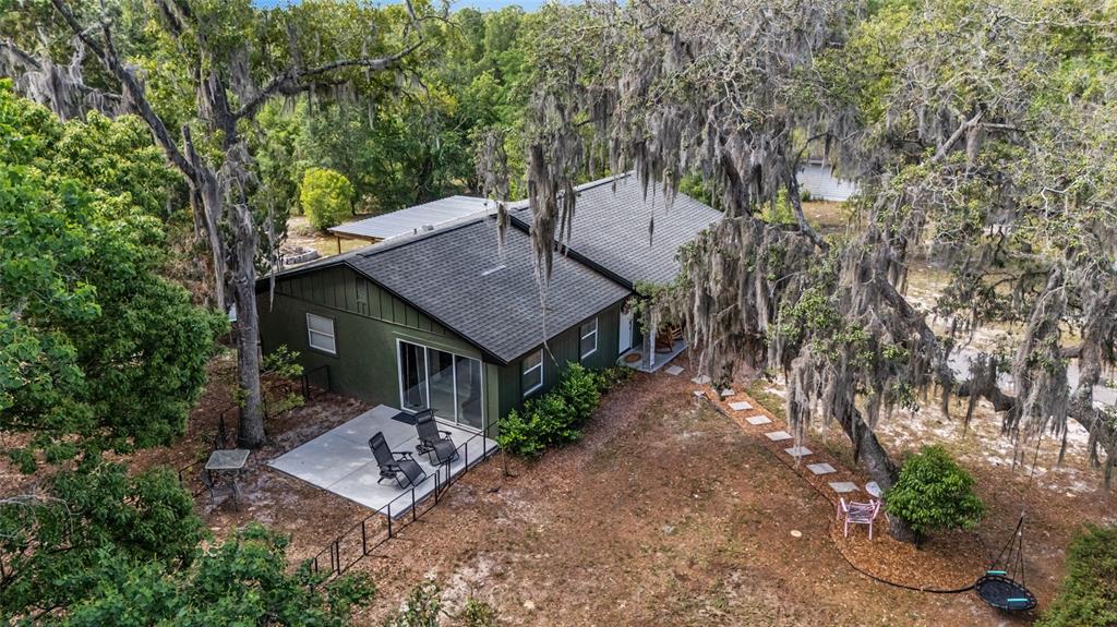 9040 Southwest 209th Circle Dunnellon, FL 34431 - Photo 45 of 55 a view of a house with a yard and tree s