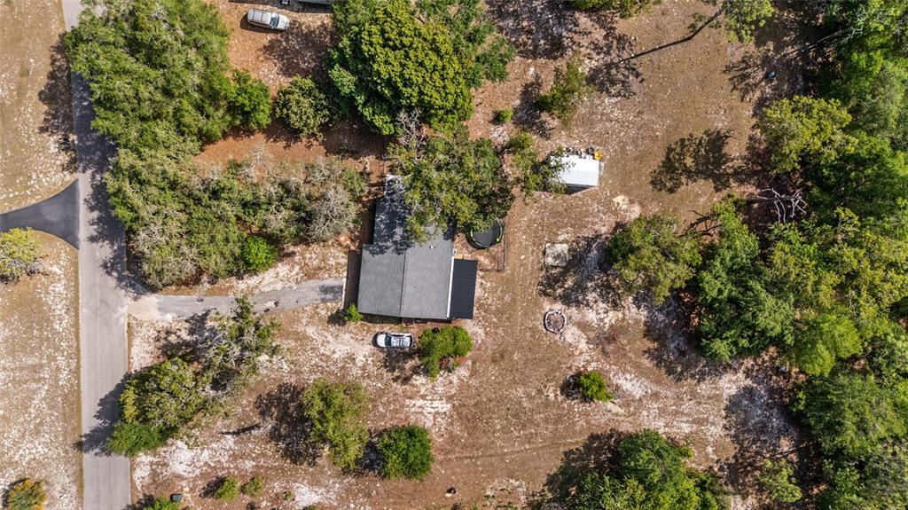 9040 Southwest 209th Circle Dunnellon, FL 34431 - Photo 48 of 55 an aerial view of a house with a yard