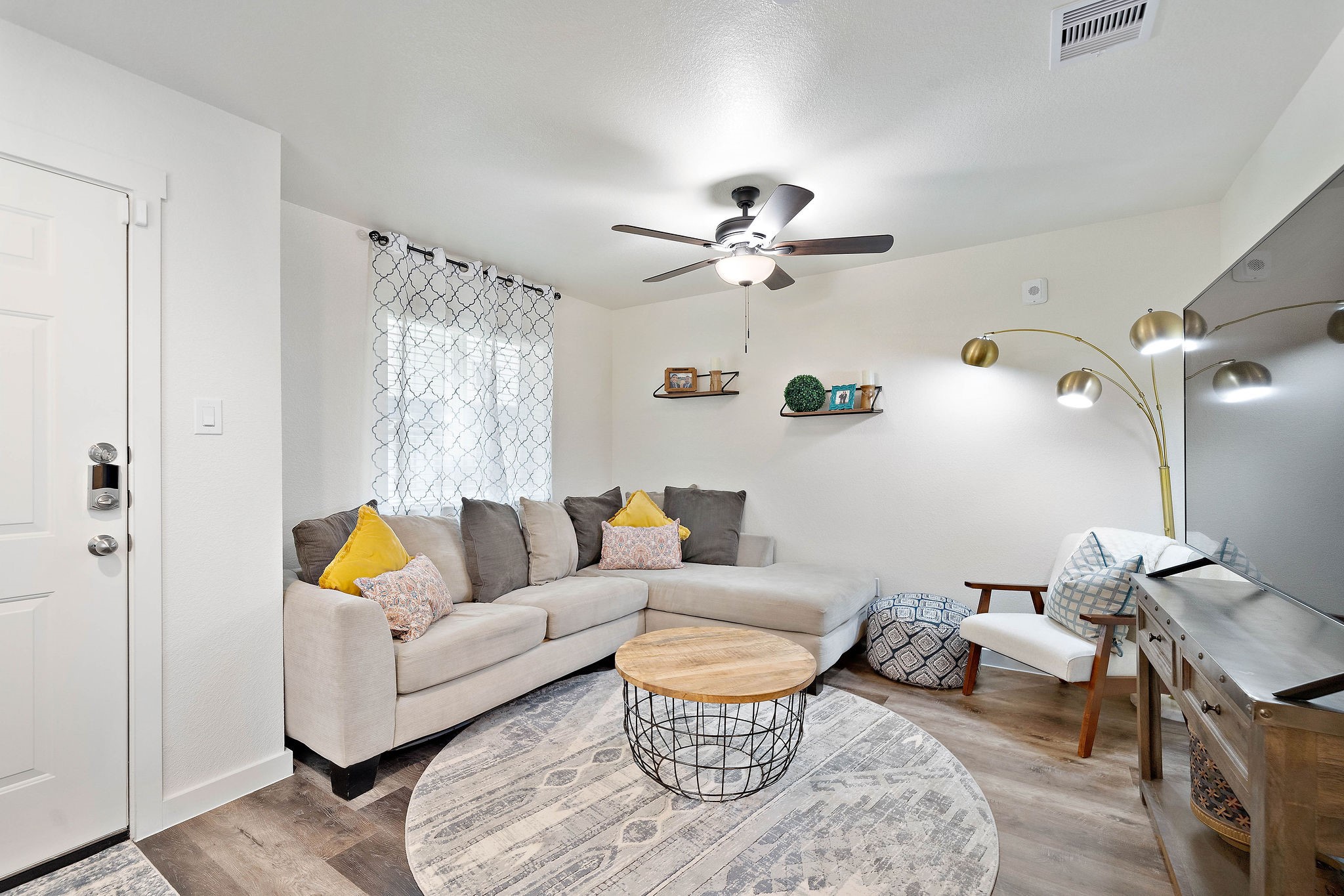 12603 Telge Road, Unit 17B Cypress, TX 77429 - Photo 1 of 21 a living room with furniture a rug and a chandelier