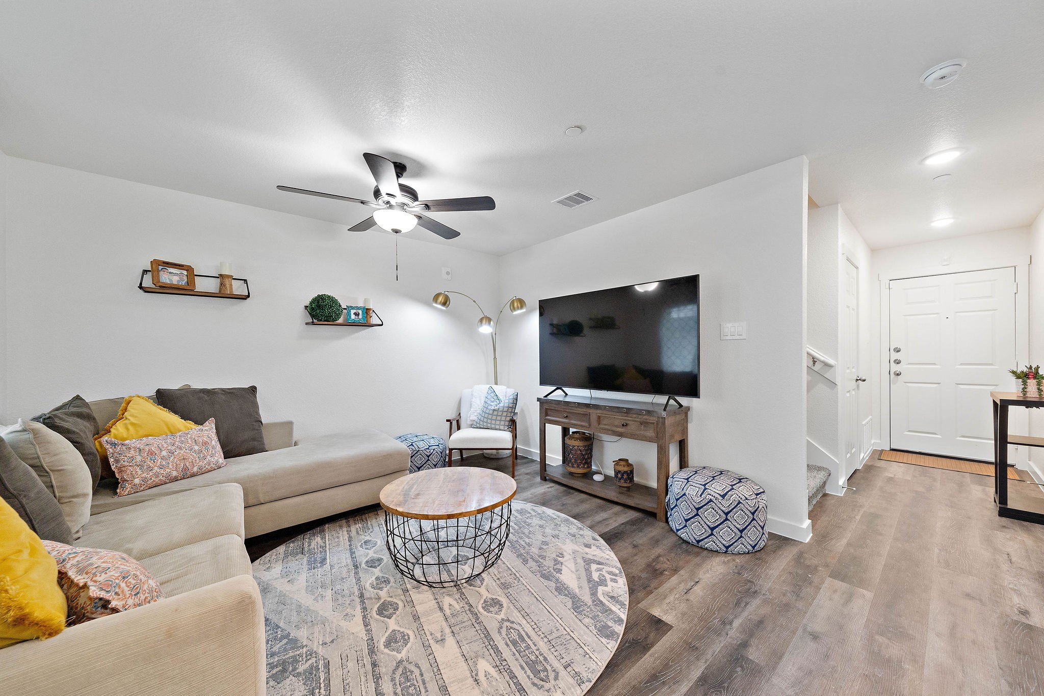 12603 Telge Road, Unit 17B Cypress, TX 77429 - Photo 19 of 21 a living room with furniture and a flat screen tv