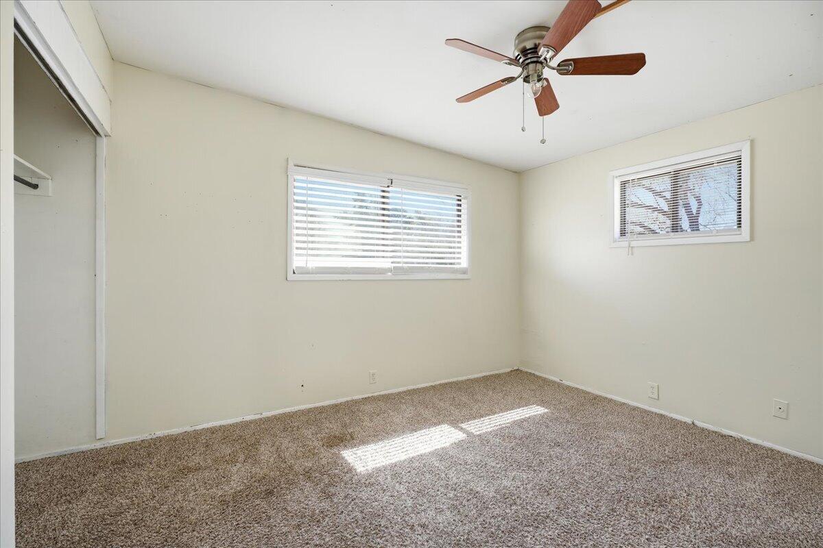2706 68th Street Lubbock, TX 79413 - Photo 11 of 20 a view of an empty room with a window