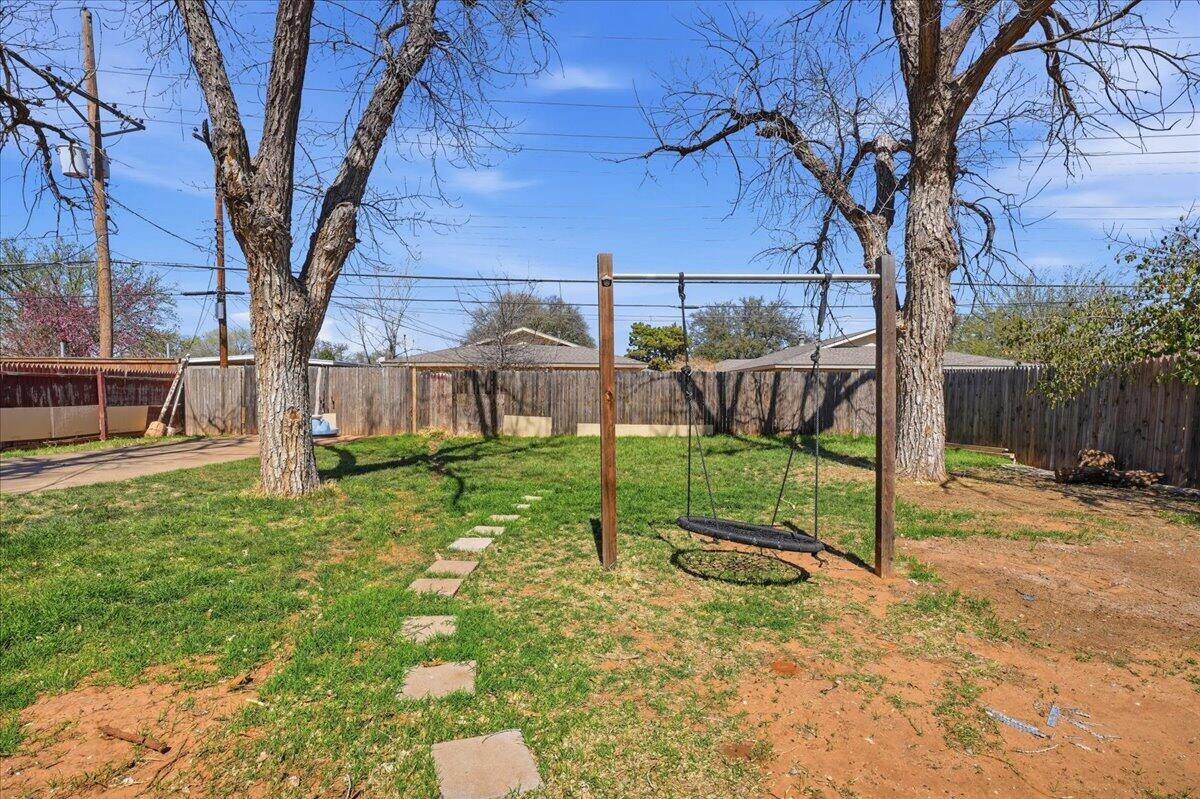 2706 68th Street Lubbock, TX 79413 - Photo 18 of 20 a view of a park with slide