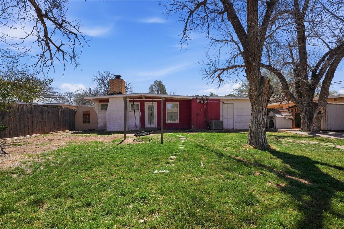 2706 68th Street Lubbock, TX 79413 - Photo 20 of 20 a house view with a garden space