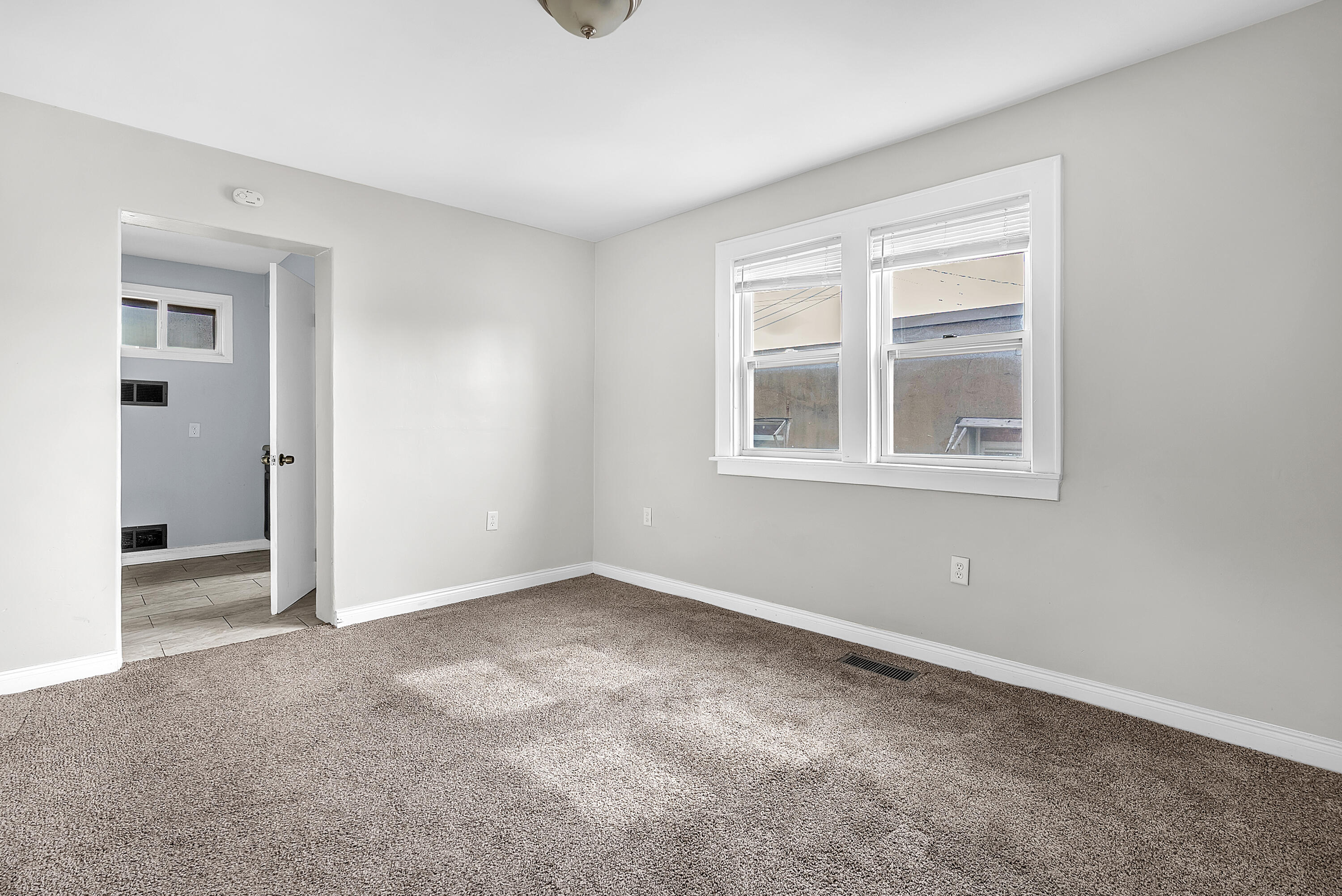 15 Rimbach Street Hammond, IN 46320 - Photo 22 of 31 a view of an empty room with a window
