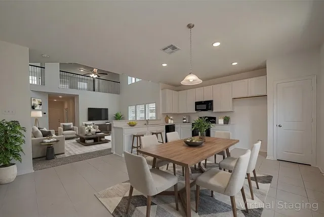 a view of a dining room with furniture