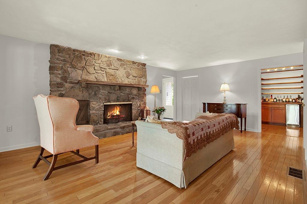 185 Barron Road Ligonier, PA 15658 - Photo 6 of 47 Another view of the living room features a wet bar in the background