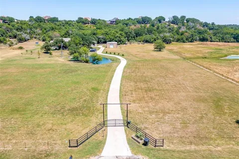 a view of a swimming pool and an outdoor space