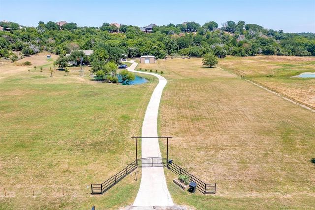 a view of a swimming pool and an outdoor space