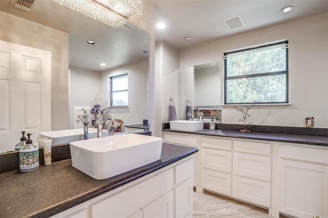 a kitchen with sink and window