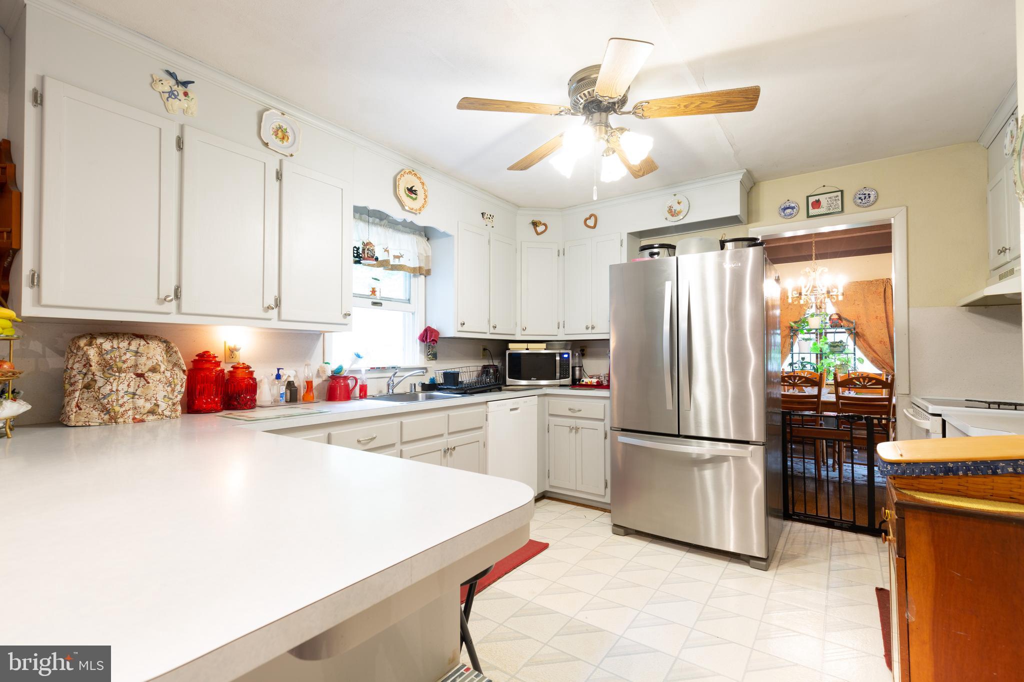 4140 Trump Road Westminster, MD 21158 - Photo 7 of 46 Kitchen has ceiling fan, breakfast bar