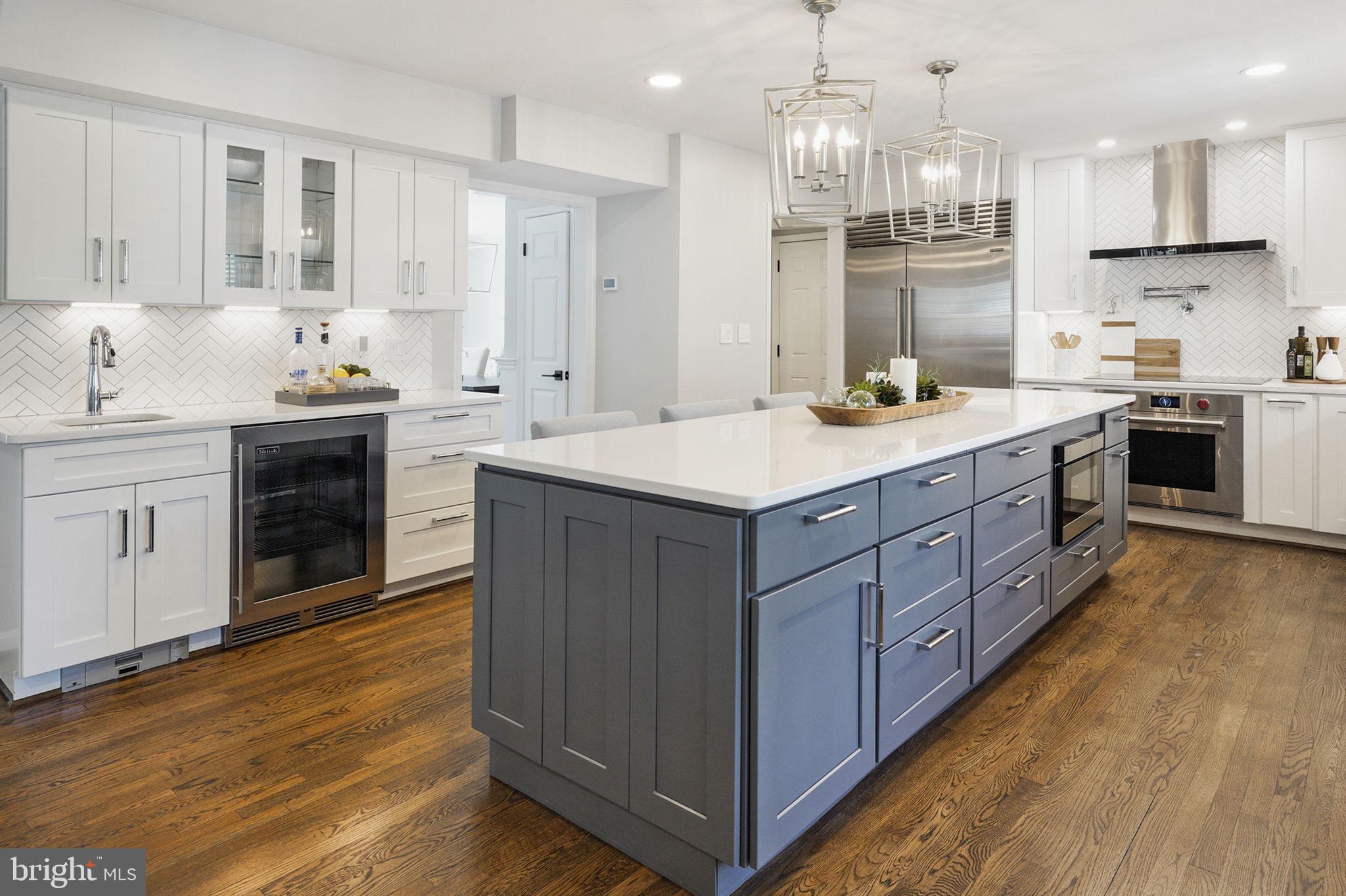 1288 Golden Eagle Drive Reston, VA 20194 - Photo 7 of 77 Quartz countertops and a large center island