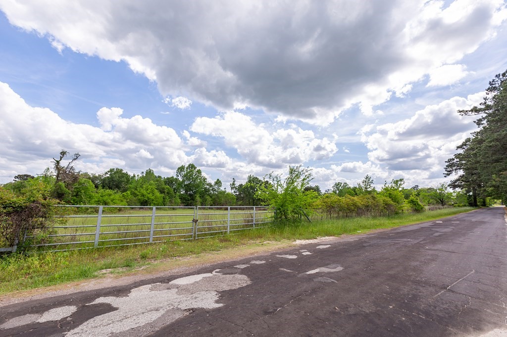 247 McCarty Road Lufkin, TX 75904 - Photo 6 of 9 a view of a golf course with a lake
