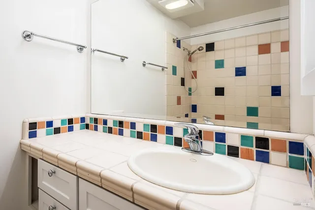 a view of an house with backyard space and garden