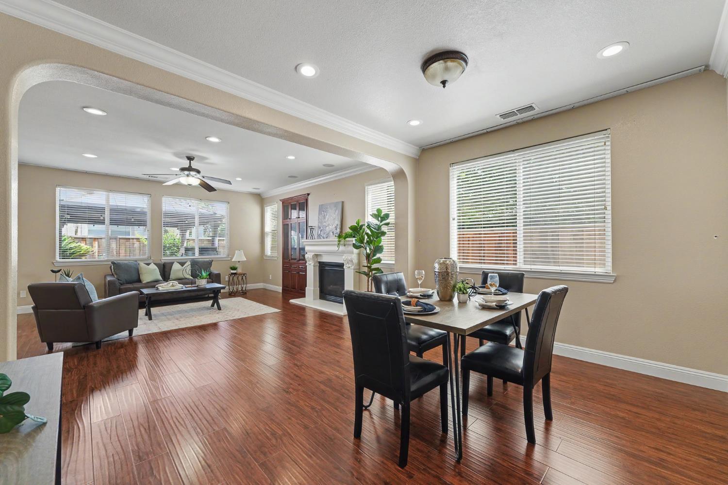 1223 East Springer Drive Turlock, CA 95382 - Photo 6 of 48 a view of a dining room with furniture window and wooden floor