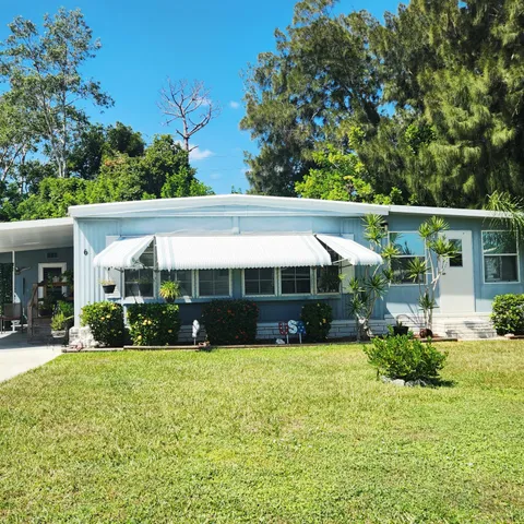 a view of a living room with a large window