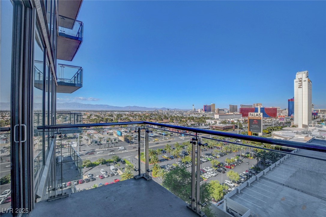 4381 West Flamingo Road, Unit 1206 Las Vegas, NV 89103 - Photo 18 of 27 Balcony with a city view and a mountain view
