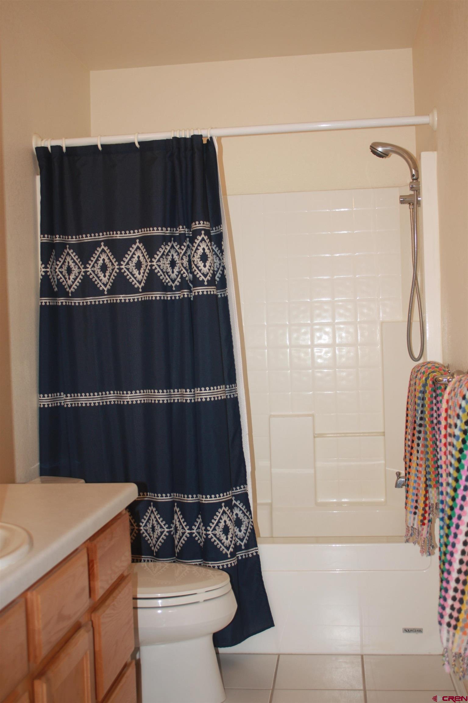 20623 Del Ray Drive Eckert, CO 81418 - Photo 15 of 22 a bathroom with a bathtub and shower