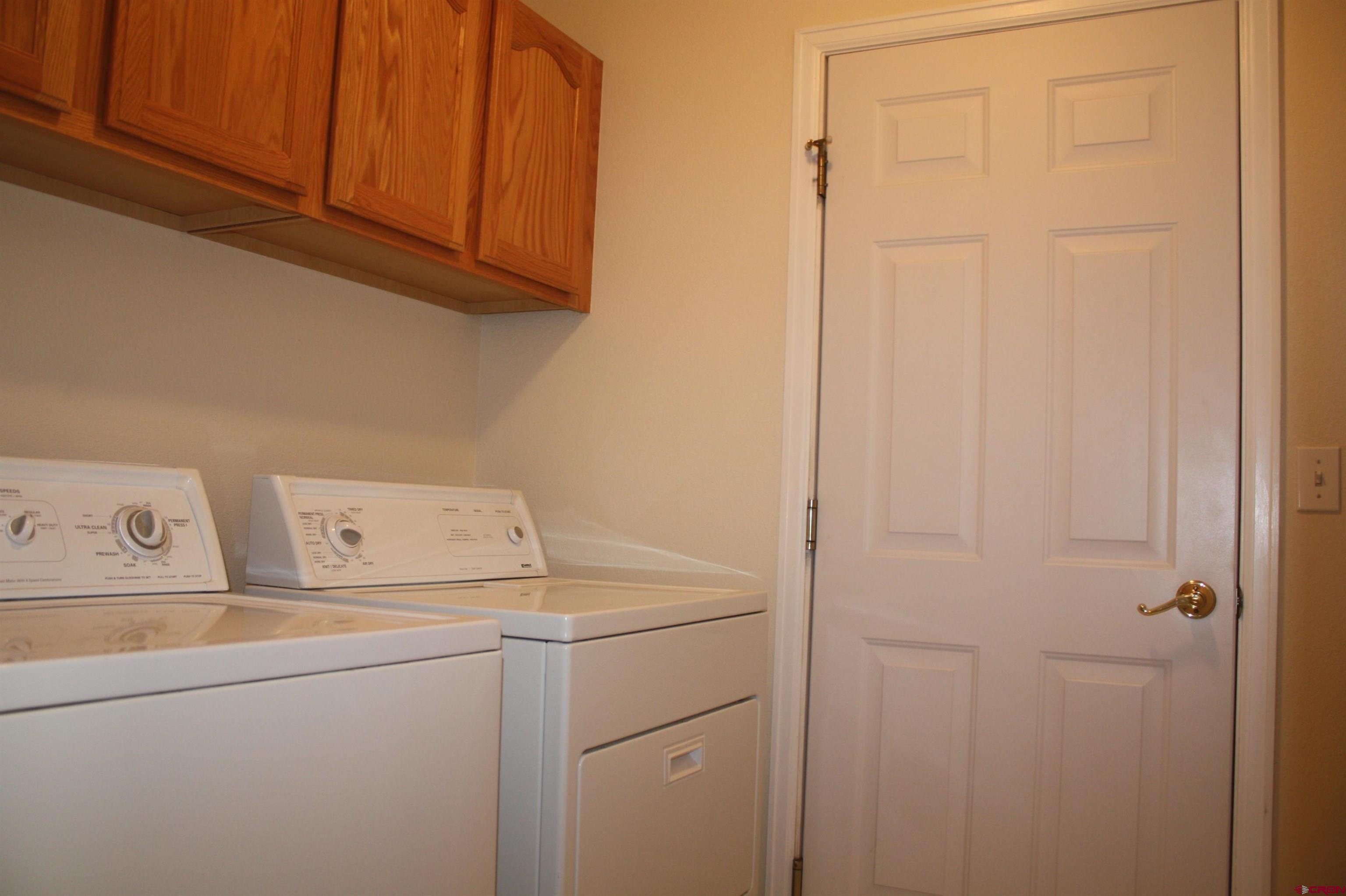 20623 Del Ray Drive Eckert, CO 81418 - Photo 16 of 22 a utility room with dryer and washer
