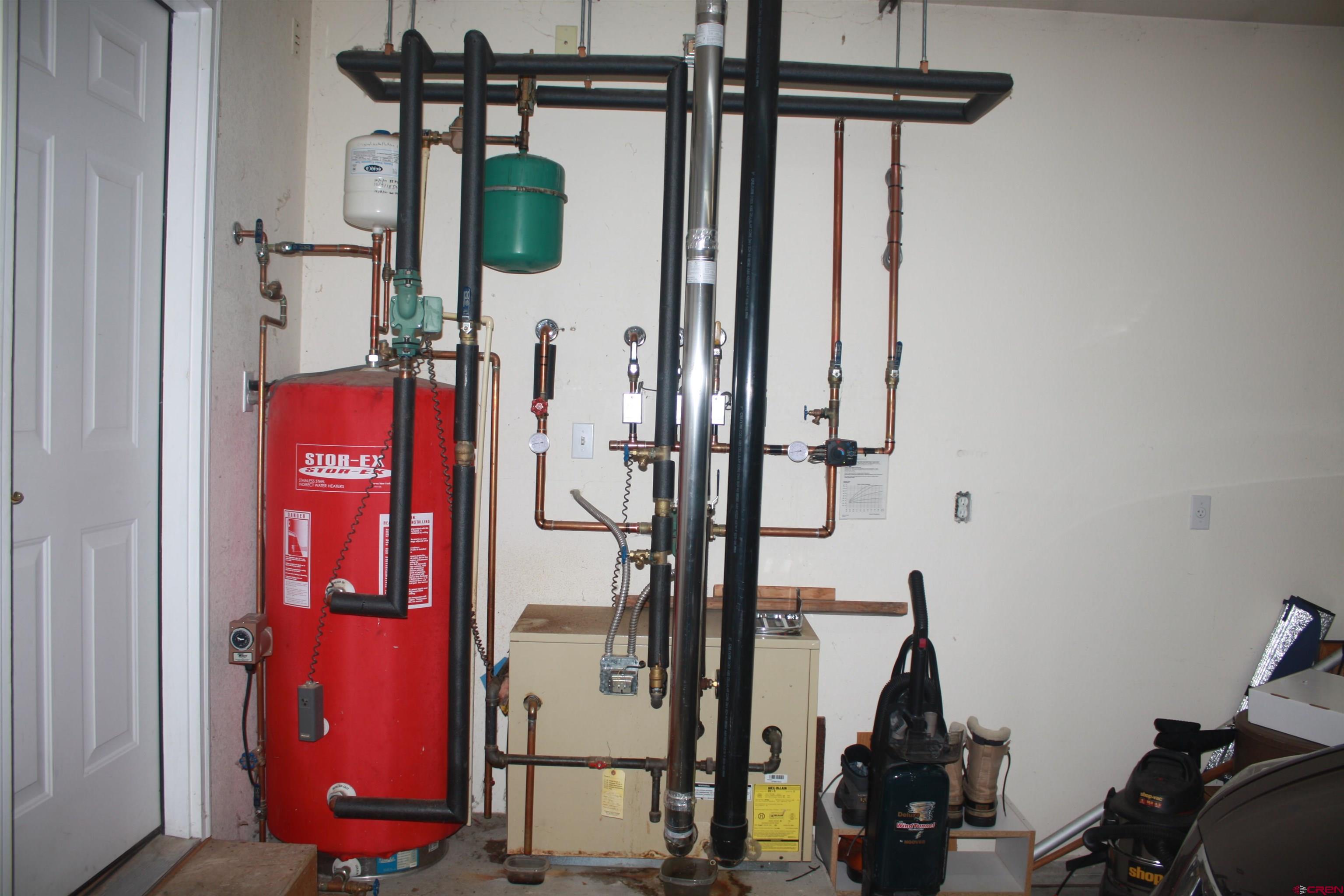 20623 Del Ray Drive Eckert, CO 81418 - Photo 20 of 22 a view of a hallway with wooden floor and windows