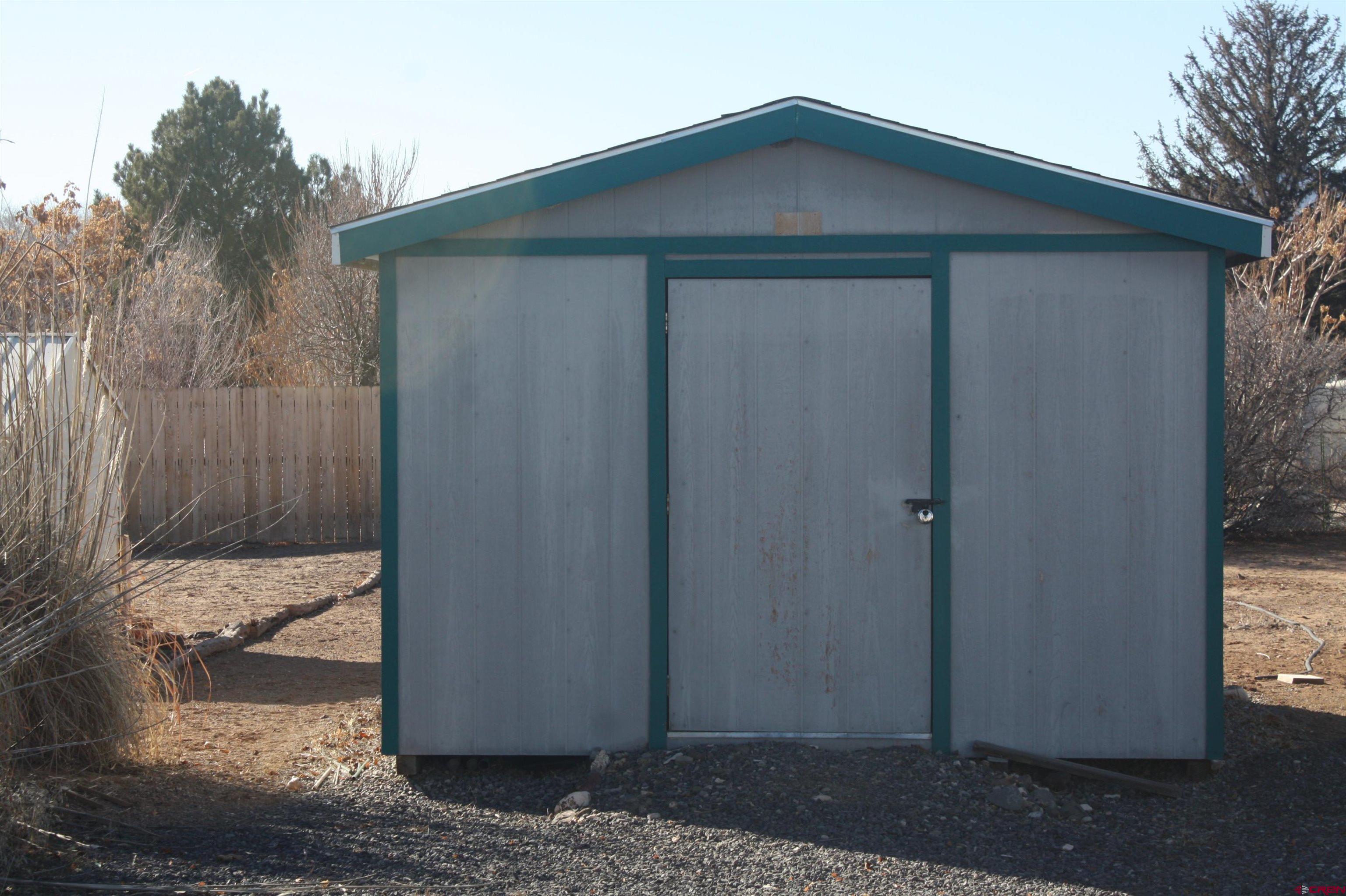 20623 Del Ray Drive Eckert, CO 81418 - Photo 22 of 22 a wooden door in front of a house