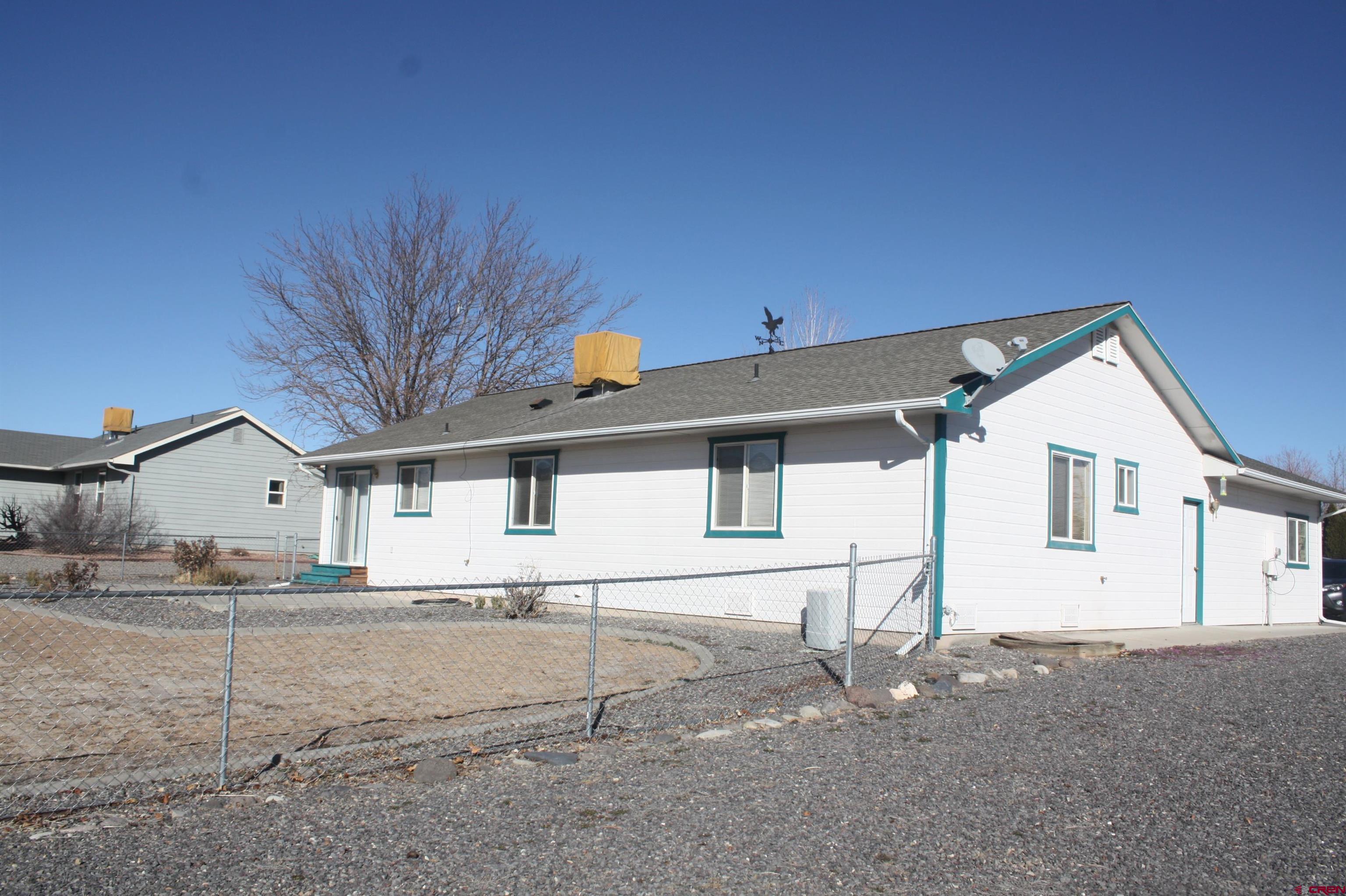 20623 Del Ray Drive Eckert, CO 81418 - Photo 3 of 22 a view of a house with a yard