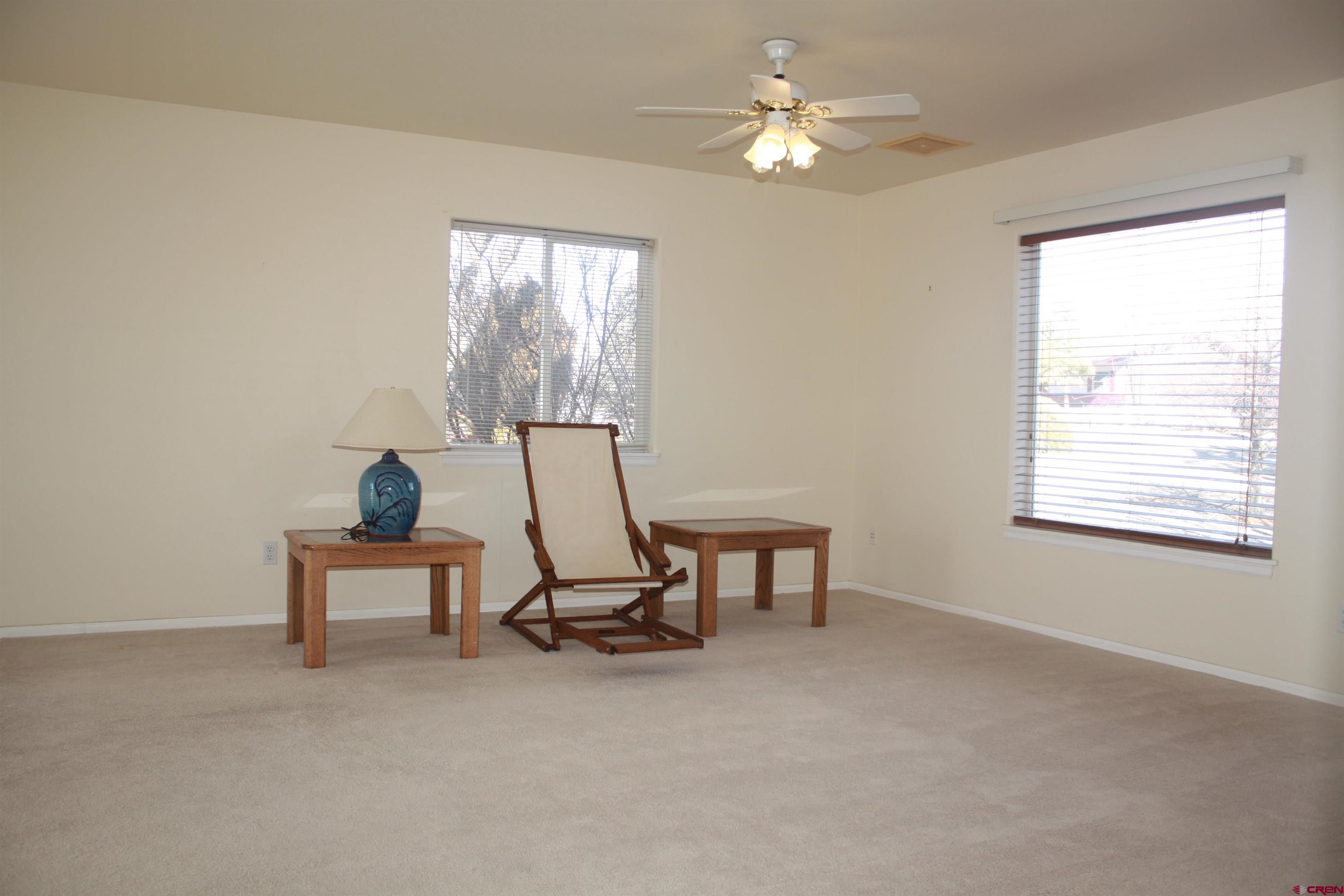 20623 Del Ray Drive Eckert, CO 81418 - Photo 8 of 22 a living room with furniture a window and a ceiling fan