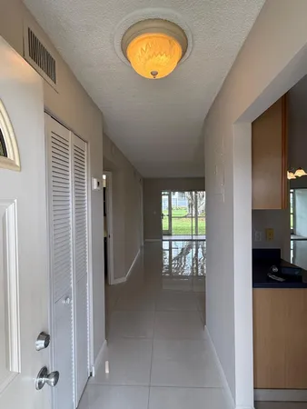 $1,975 | 9911 Sandalfoot Boulevard, Unit 105, Boca Raton, FL 33428