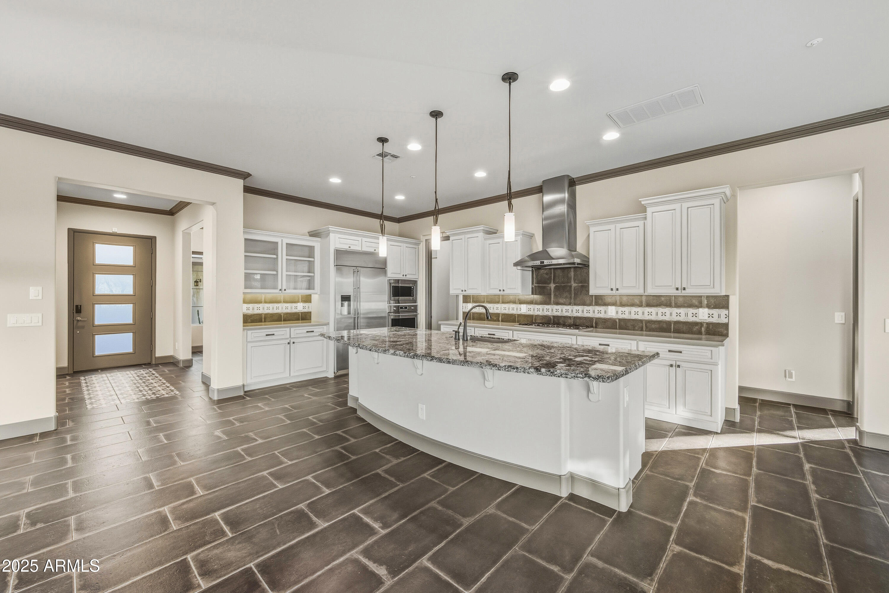 17856 East Vista Desierto Rio Verde, AZ 85263 - Photo 15 of 46 a kitchen with stainless steel appliances granite countertop a stove a sink and a refrigerator