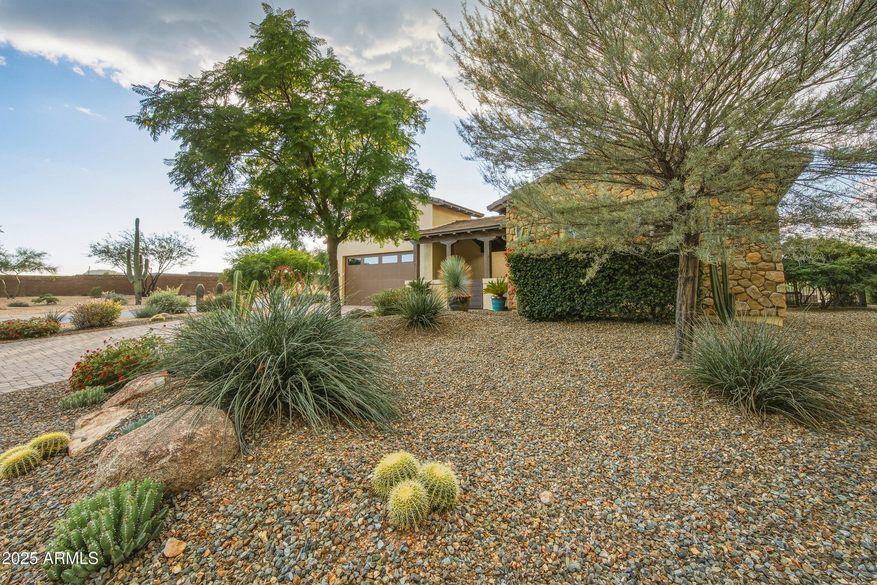 17856 East Vista Desierto Rio Verde, AZ 85263 - Photo 2 of 46 a view of a dry yard with trees