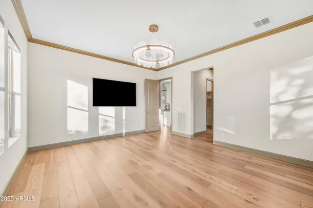 a view of a livingroom with wooden floor