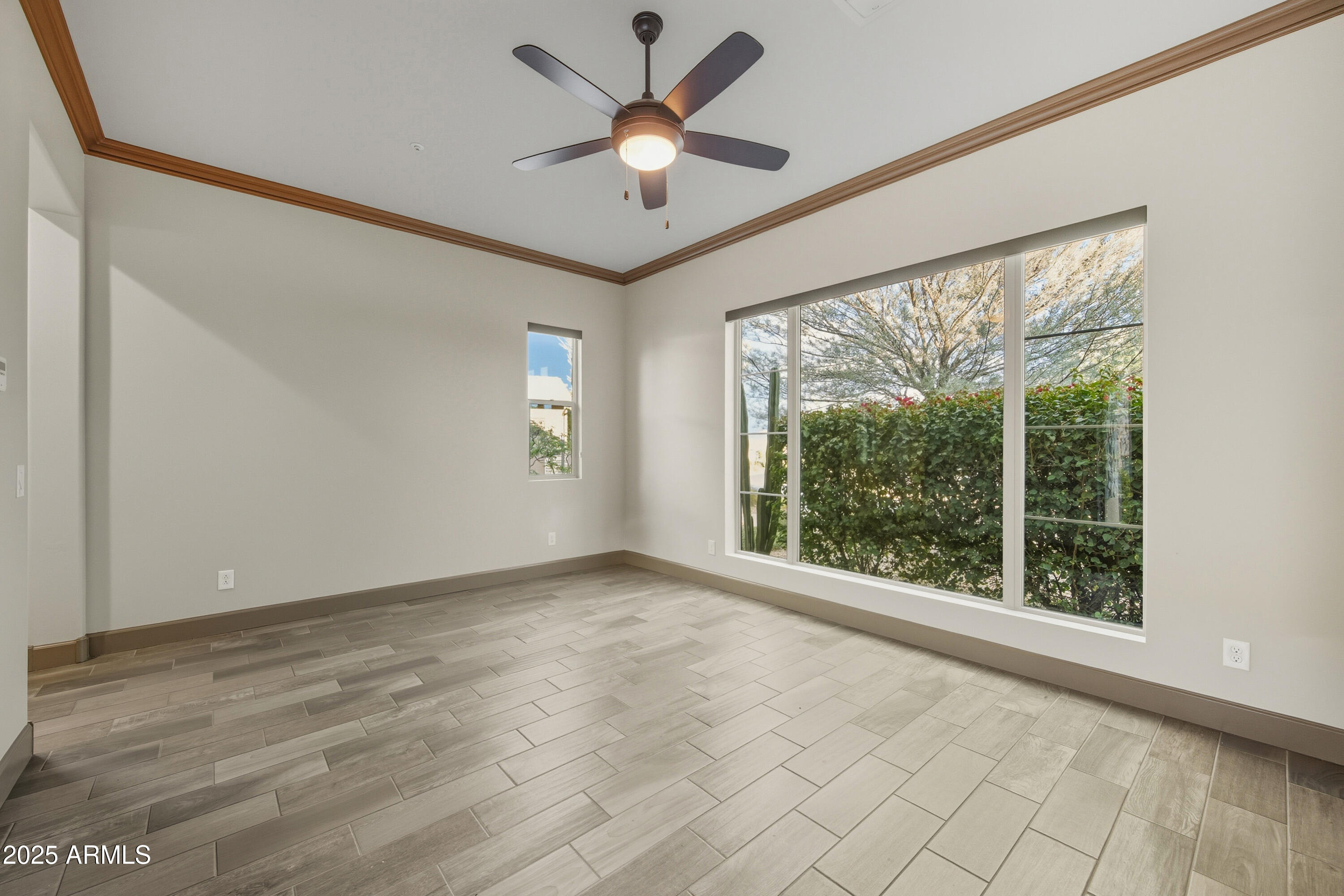 17856 East Vista Desierto Rio Verde, AZ 85263 - Photo 29 of 46 wooden floor in an empty room with a window