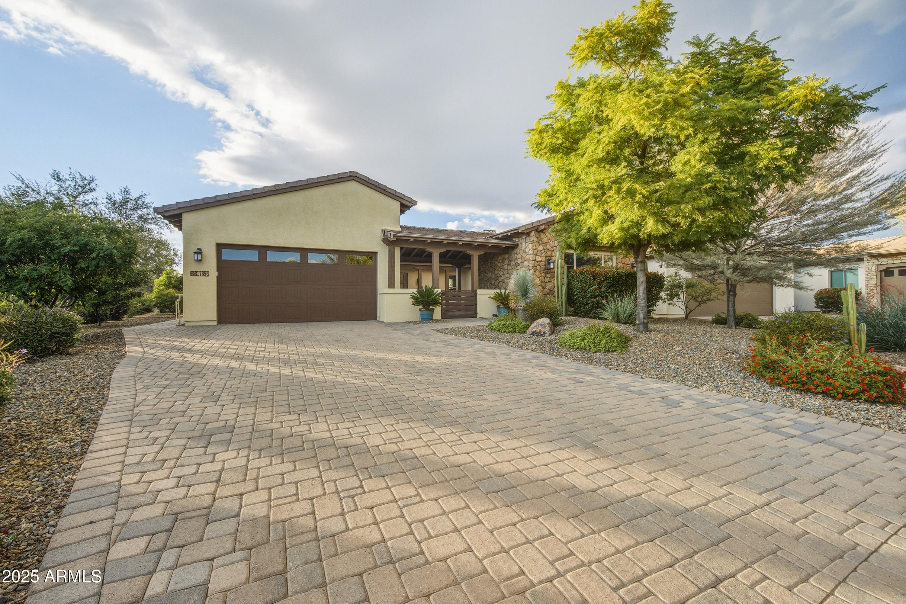 17856 East Vista Desierto Rio Verde, AZ 85263 - Photo 3 of 46 a front view of a house with a yard and potted plants