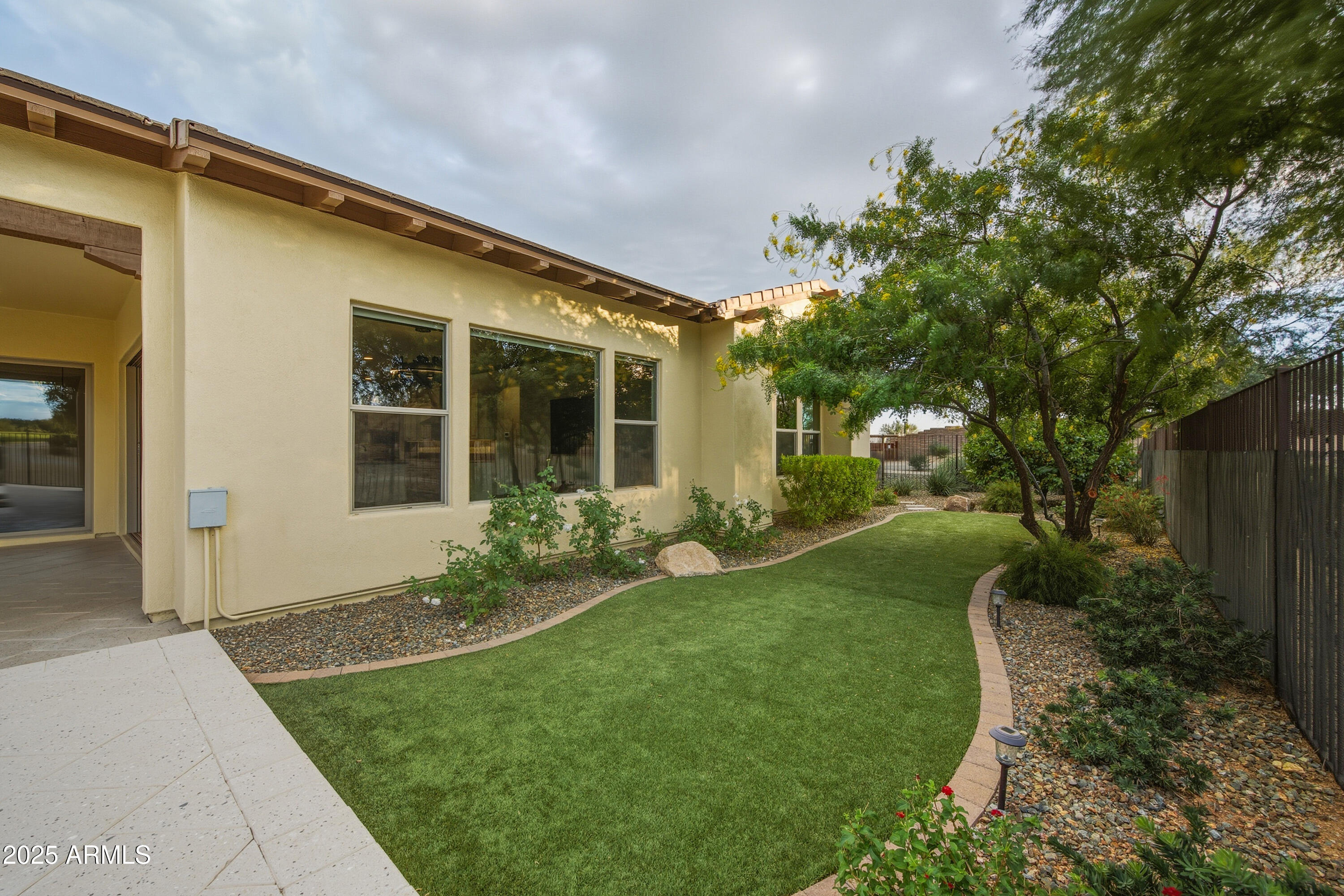 17856 East Vista Desierto Rio Verde, AZ 85263 - Photo 38 of 46 a front view of a house with garden
