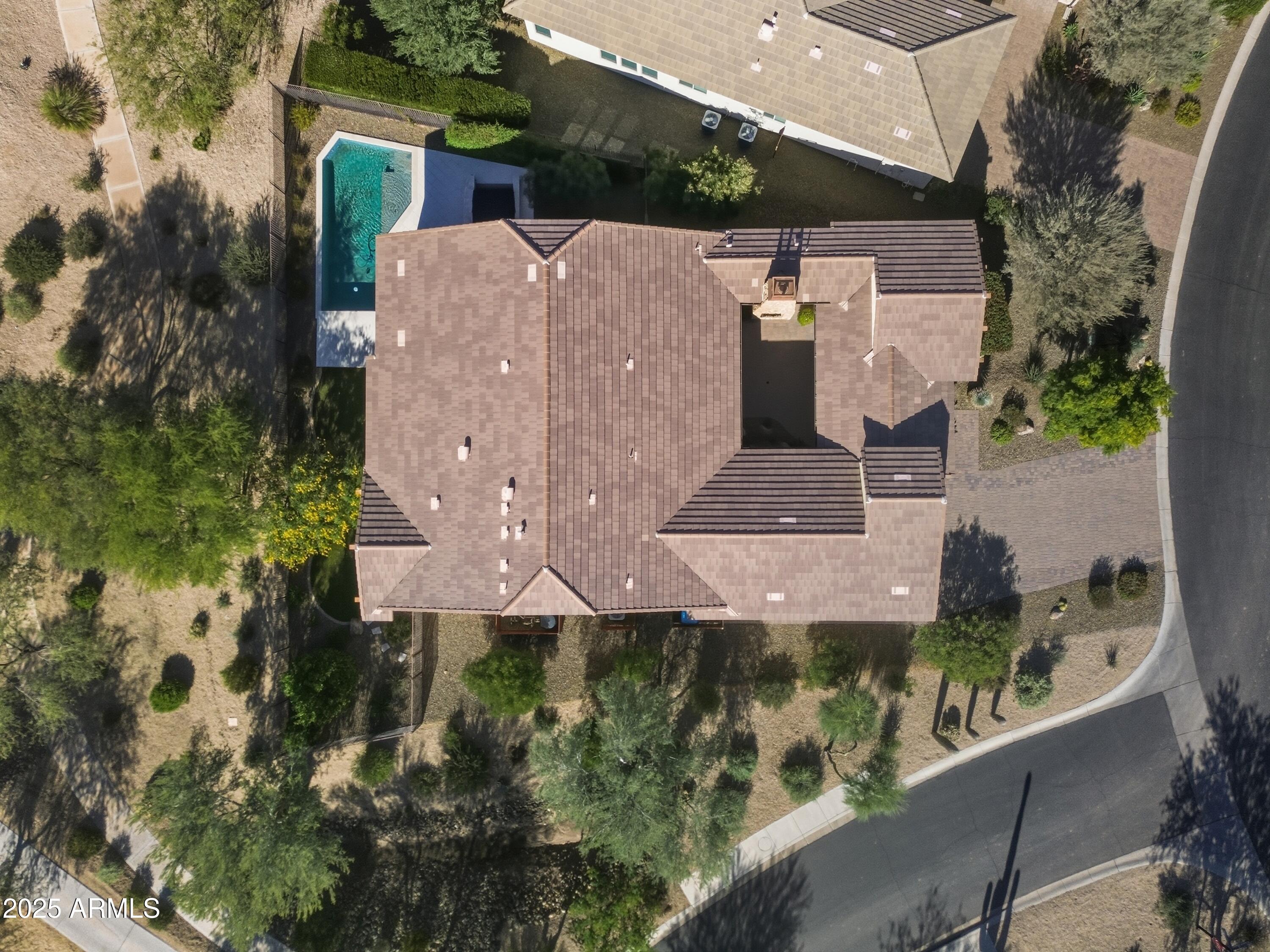 17856 East Vista Desierto Rio Verde, AZ 85263 - Photo 41 of 46 an aerial view of a house with a yard and large tree