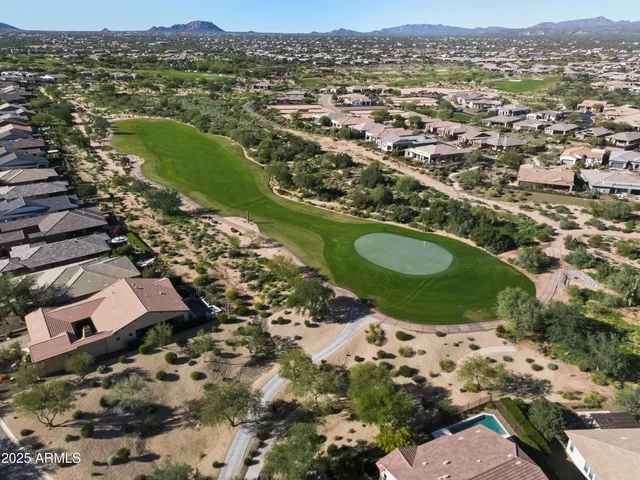 an aerial view of residential house with outdoor space