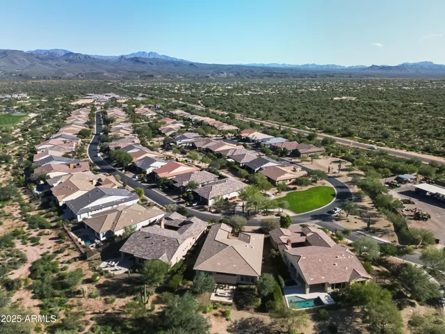 an aerial view of a city with lots of residential buildings