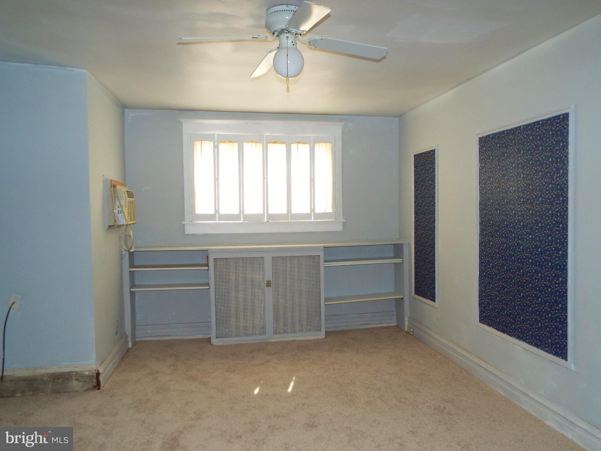 220 Ashby Road Upper Darby, PA 19082 - Photo 7 of 27 Main bedroom with built ins and wall AC