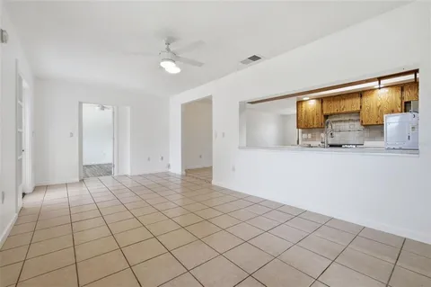 a view of a livingroom and a bathroom
