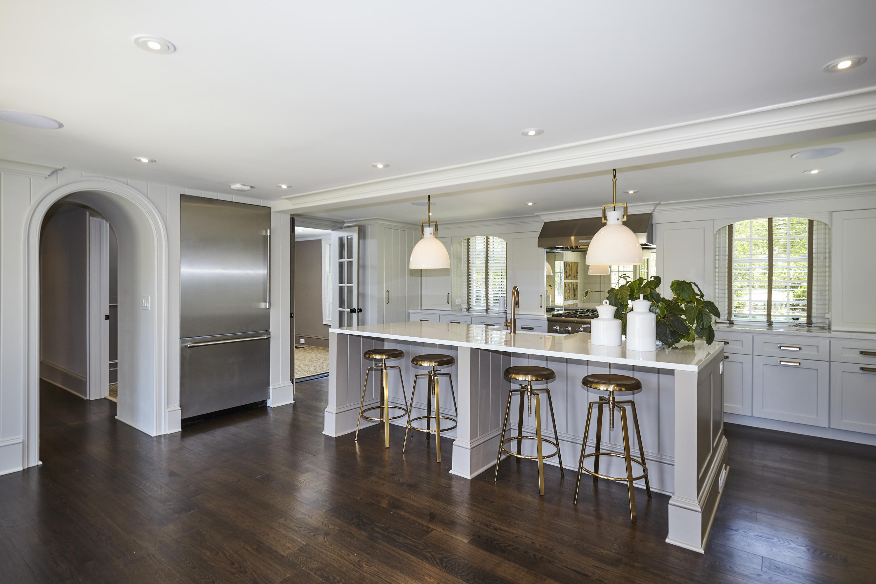 756 Ponus Ridge Road New Canaan, CT 06840 - Photo 11 of 54 a kitchen with stainless steel appliances granite countertop a white cabinets and wooden floor