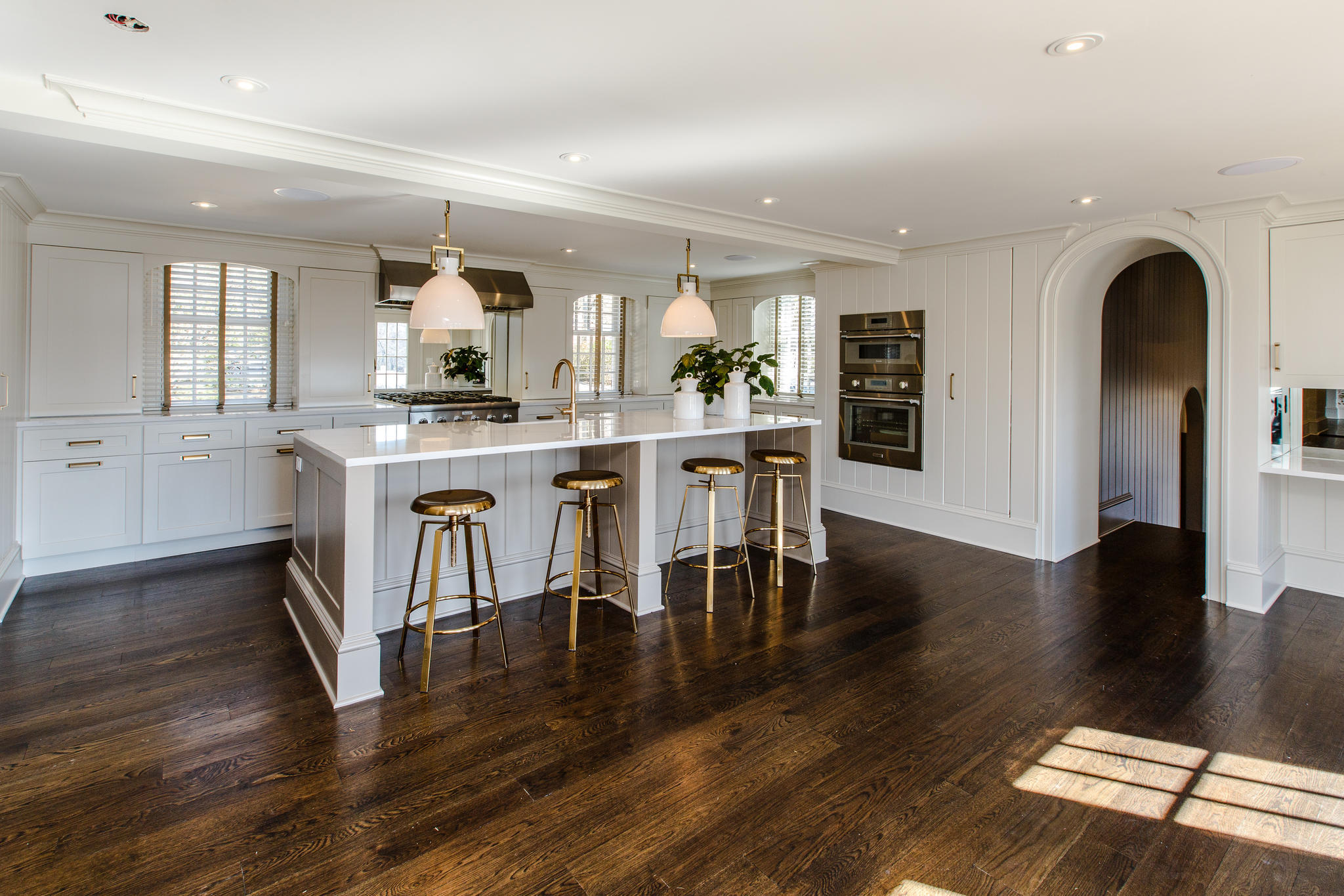 756 Ponus Ridge Road New Canaan, CT 06840 - Photo 16 of 54 a view of a kitchen with dining table and chairs