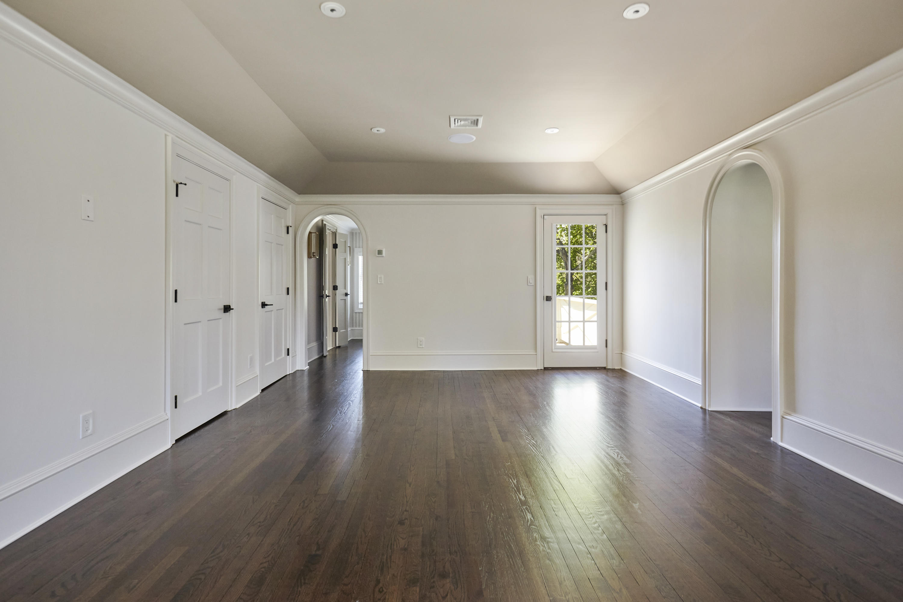 756 Ponus Ridge Road New Canaan, CT 06840 - Photo 20 of 54 a view of an empty room with wooden floor and entryway