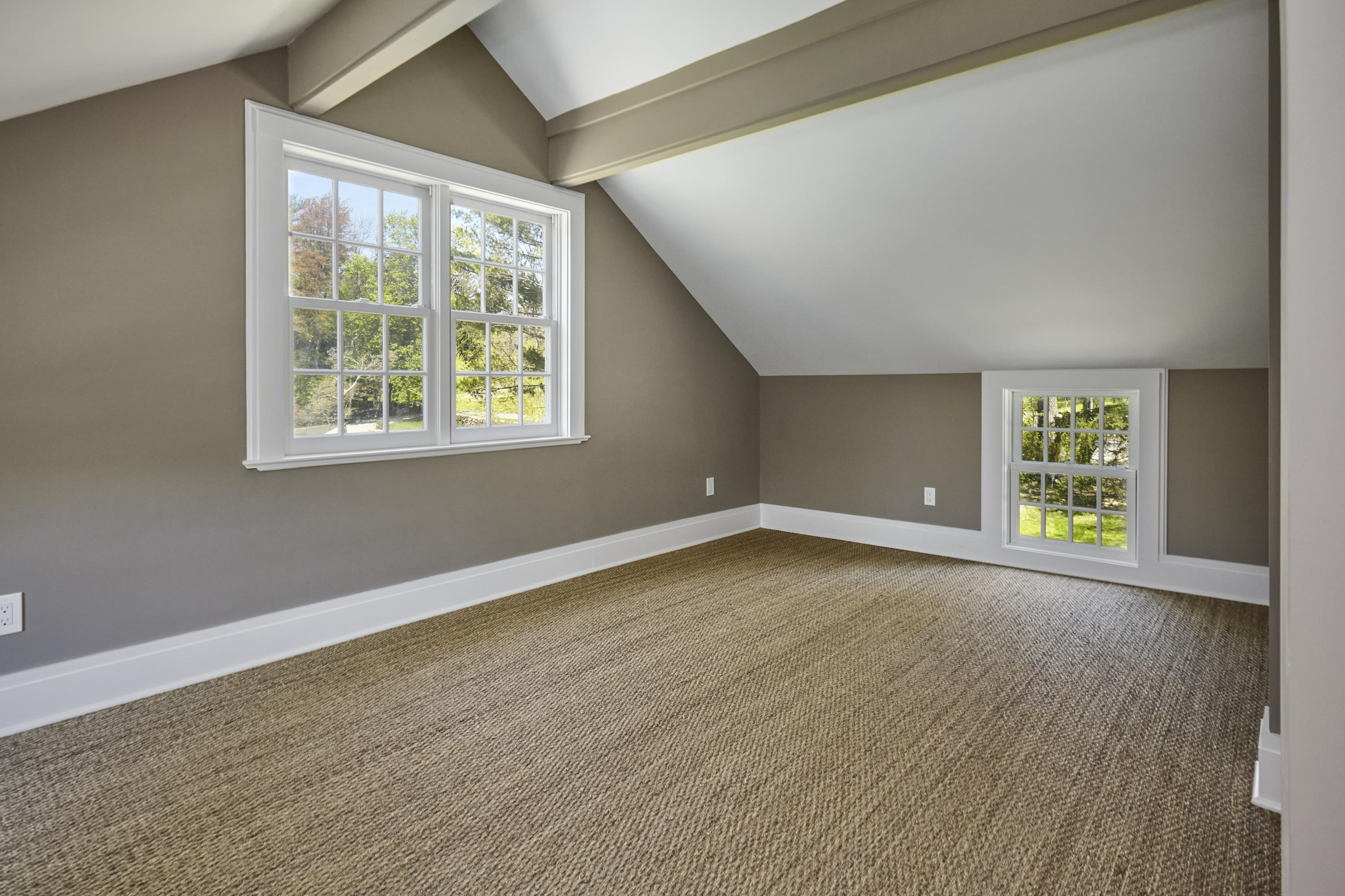 756 Ponus Ridge Road New Canaan, CT 06840 - Photo 24 of 54 an empty room with wooden floor and windows