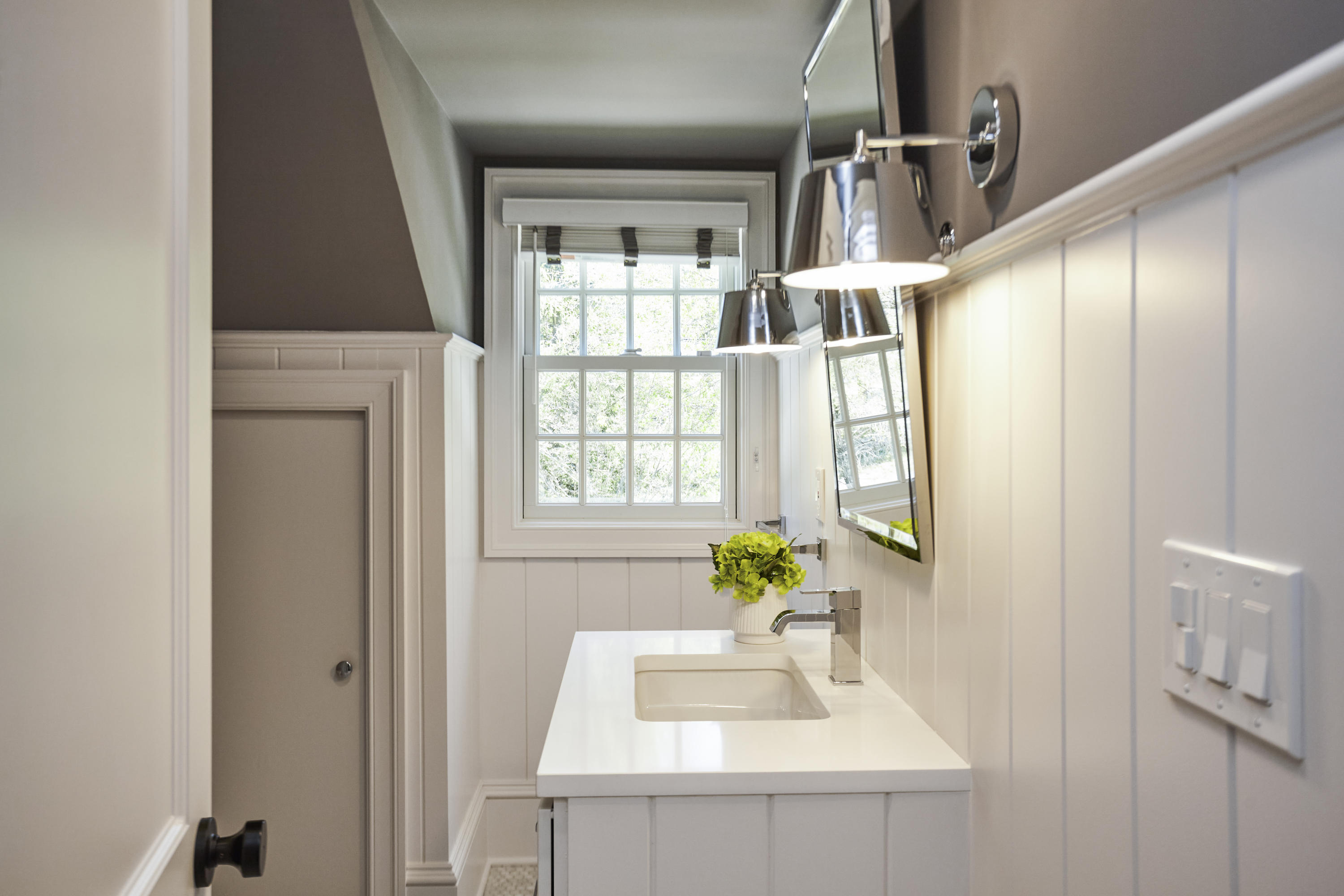 756 Ponus Ridge Road New Canaan, CT 06840 - Photo 29 of 54 a bathroom with a sink a window and a mirror
