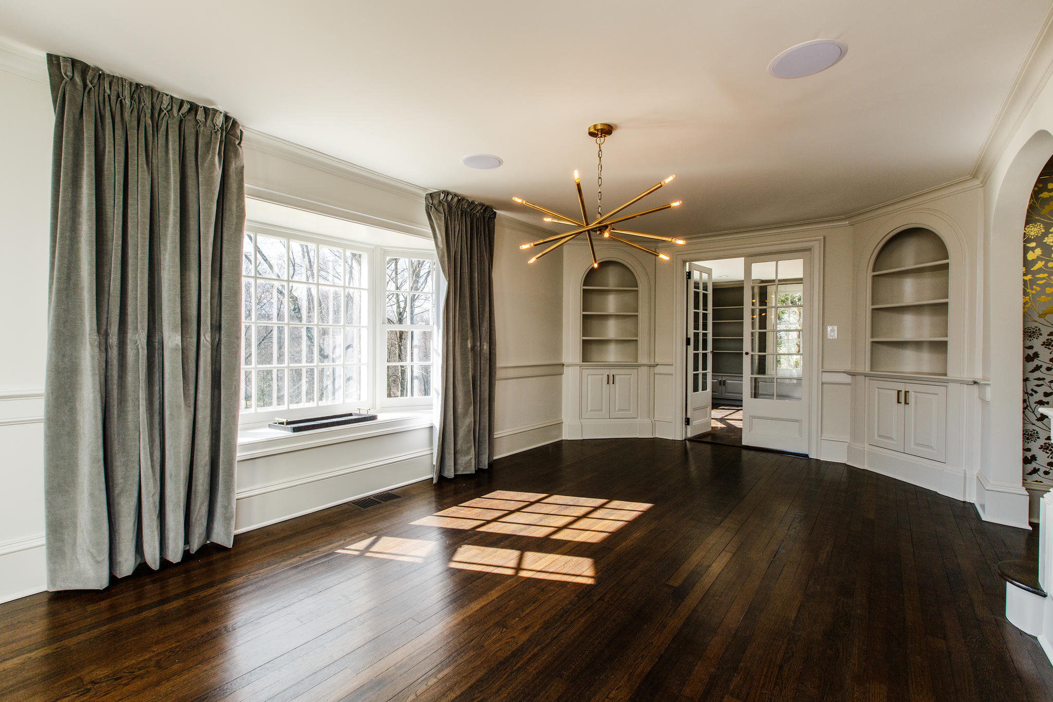 756 Ponus Ridge Road New Canaan, CT 06840 - Photo 5 of 54 a view of an empty room with window and wooden floor